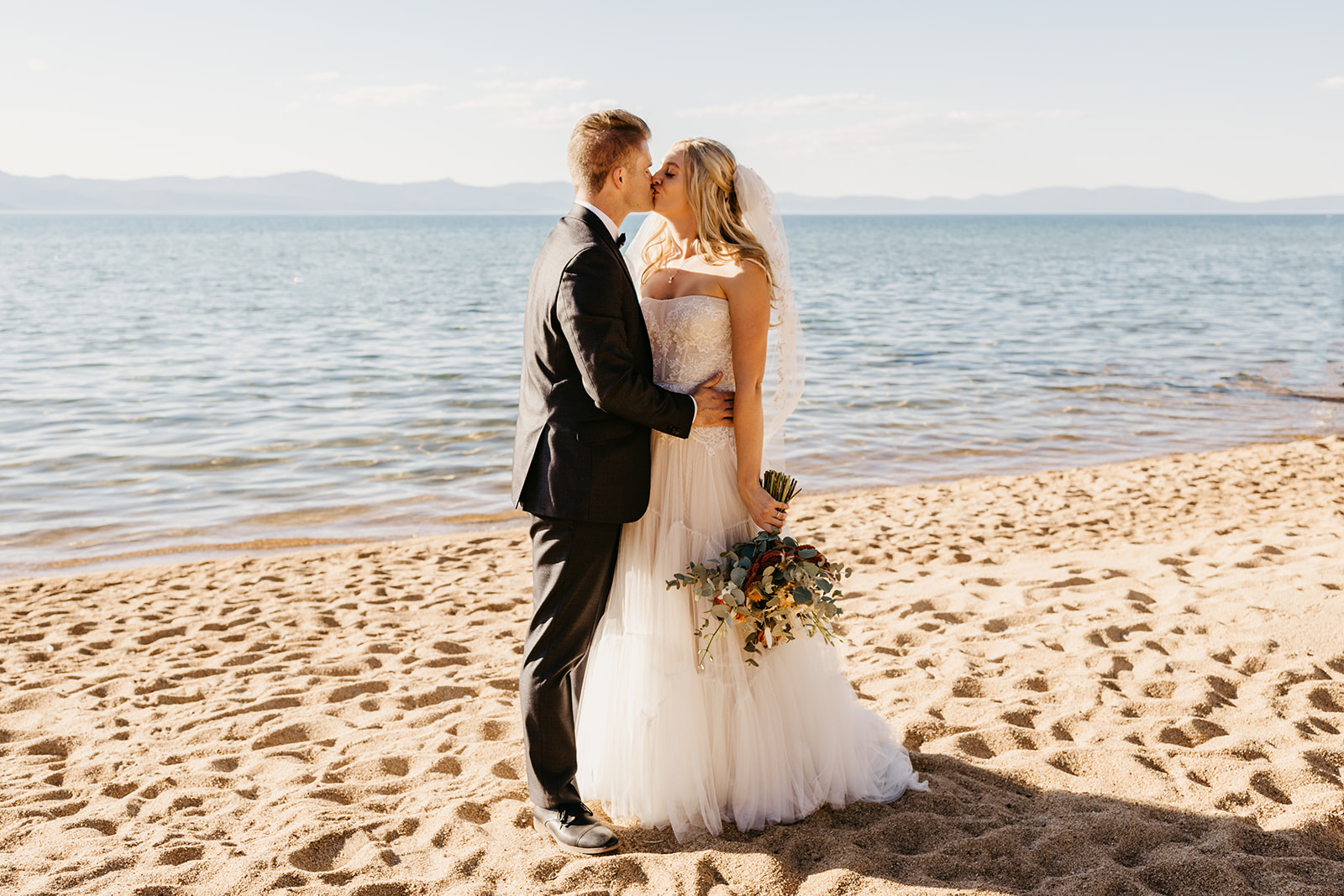 Check out this dream wedding at Lakeside Beach South Tahoe; captured by Dani Rawson Photo, a Lake Tahoe Wedding Photographer
