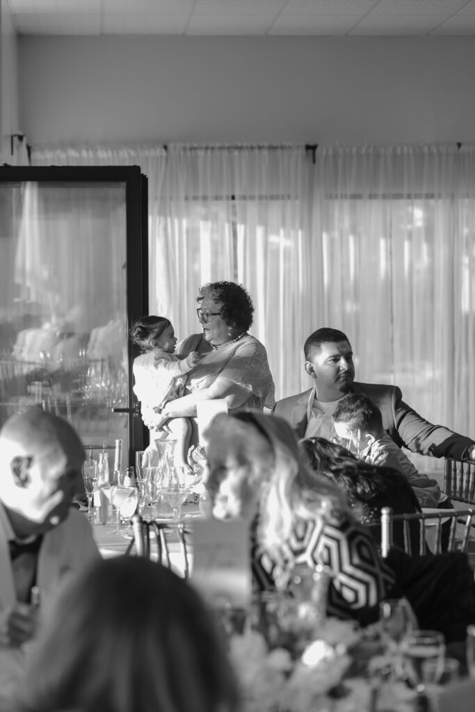Candid documentary style photo of guests during cocktail hour at Crystal Springs Golf Course in Burlingame CA